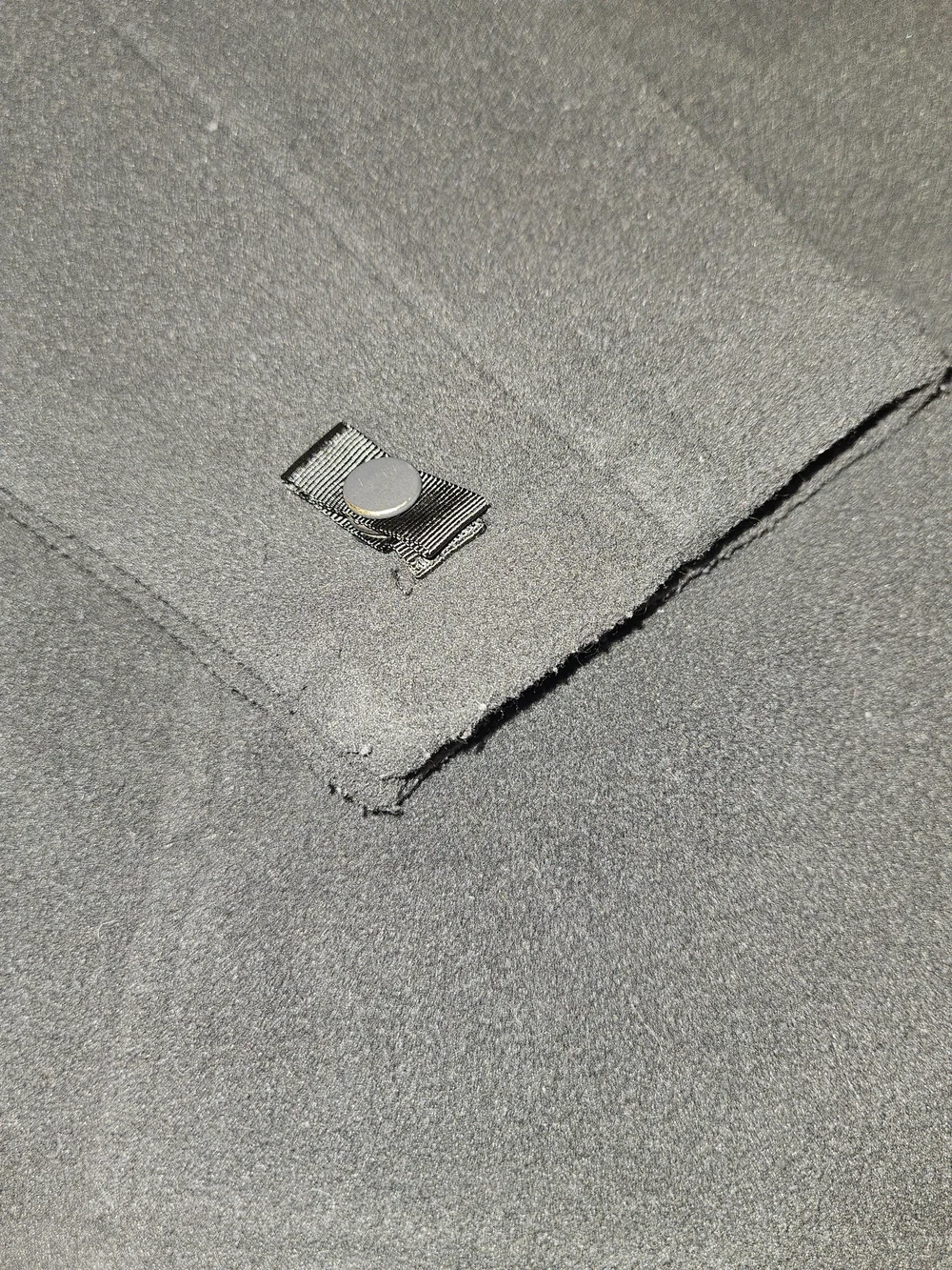 The North Face Kids Dark Gray Fleece Jacket.